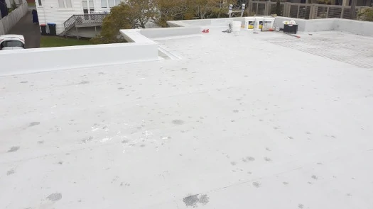 A broken and old membrane roof waiting to be restored by our flat roof experts